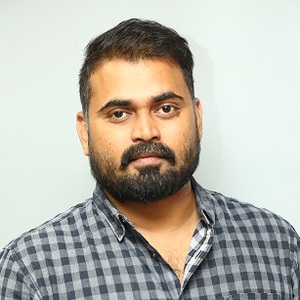 Naveen A