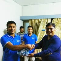 Receiving first prize for champions  indoor game.