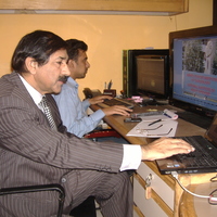 Mr Ihsan Qadir Hashmi in Editing suit.