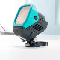 Action camera accessory that removes droplets